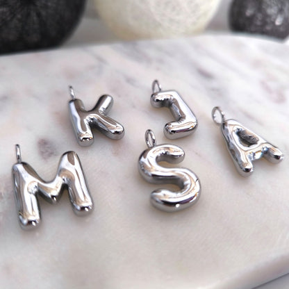 Inicial Flotante Medium Plata