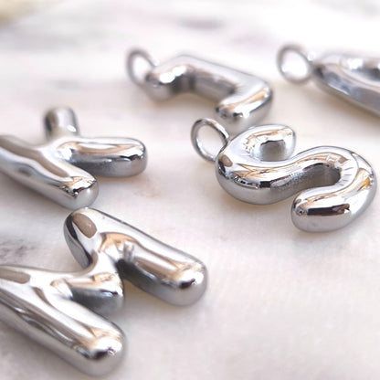 Inicial Flotante Medium Plata