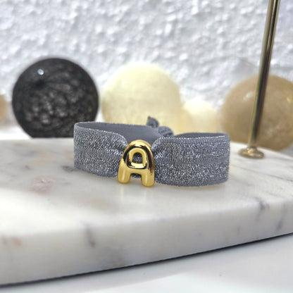 PULSERA ELÁSTICA BRILLO+CHARM SÍMBOLOS