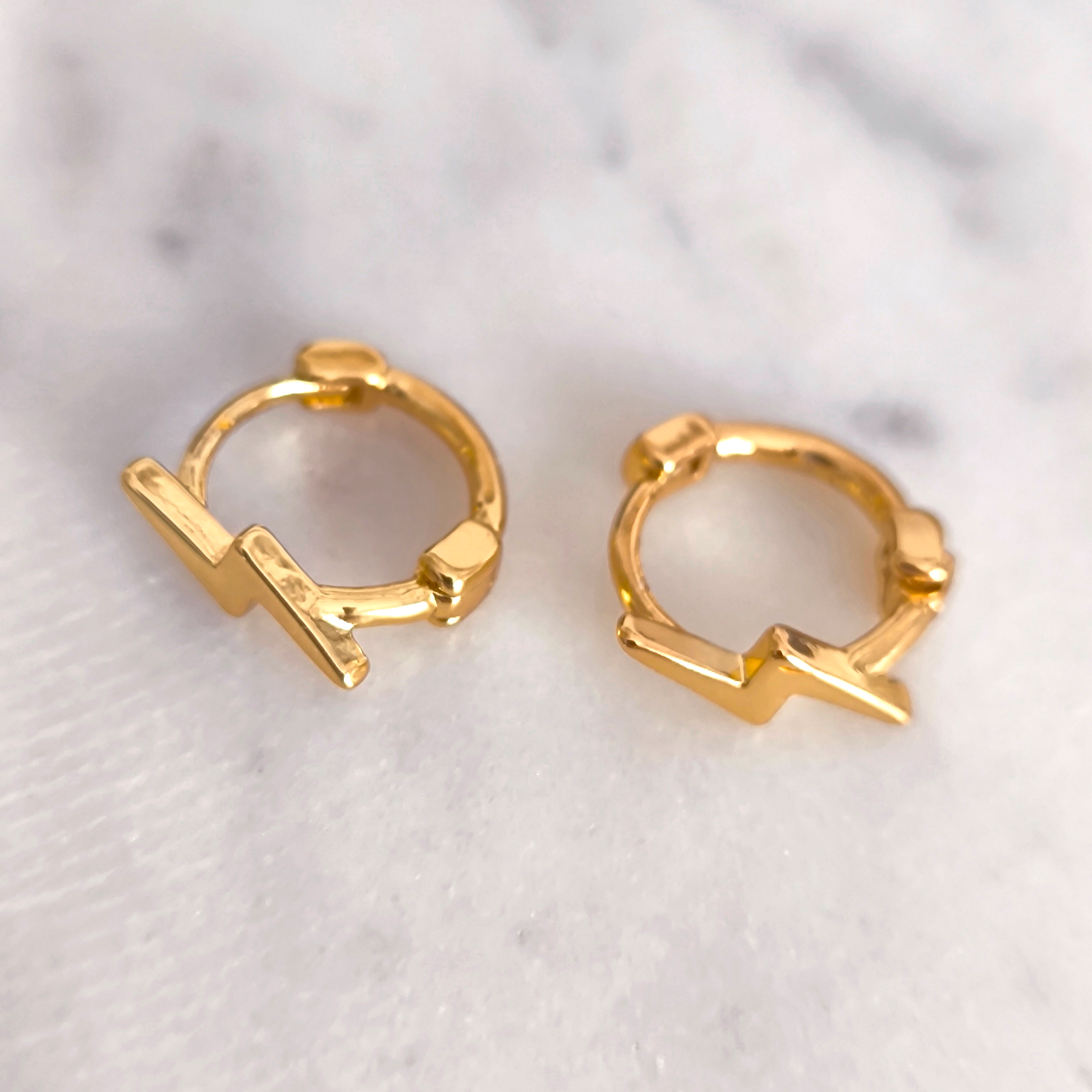 Aretes Rayo Doble Relieve