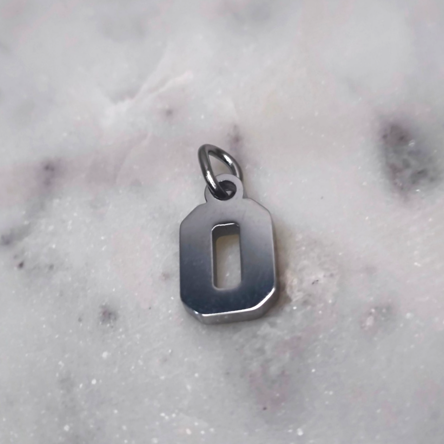 Charm número Plata