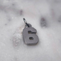 Charm número Plata