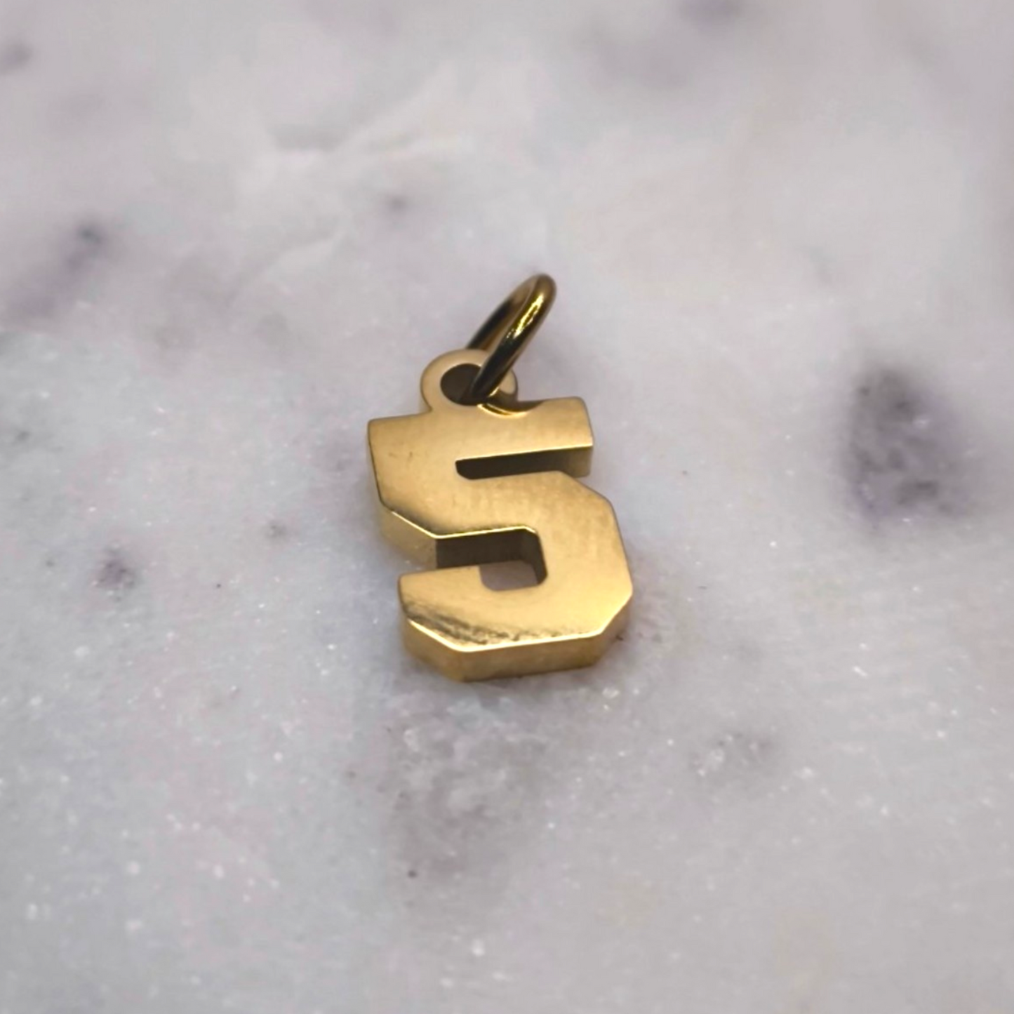 Charm número
