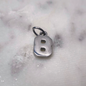 Charm número Plata