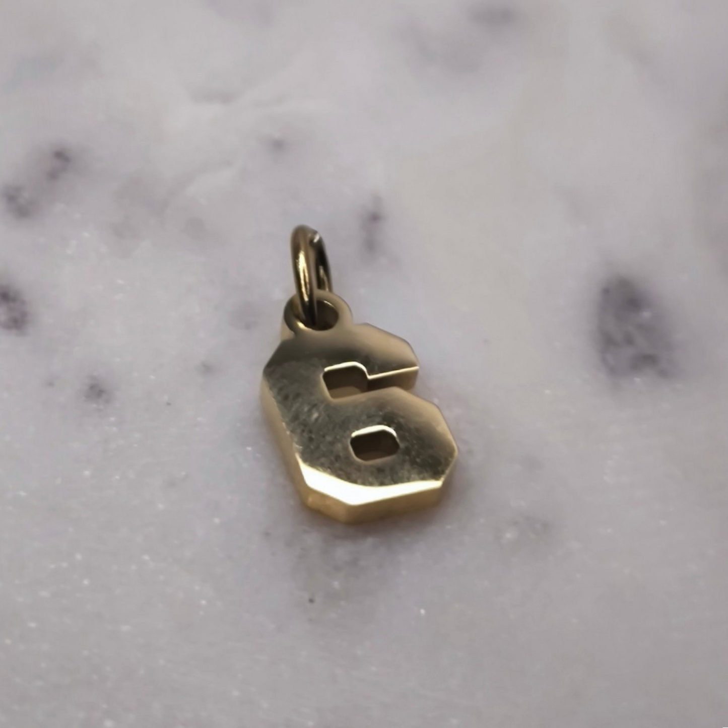 Charm número